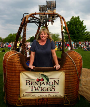 Owner Julie Millen in a Benjamin Twiggs hot air balloon basket